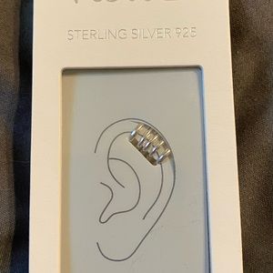 BRAND NEW IN BOX!
1 earring cuff 
No piercing necessary. Sterling Silver 925
